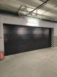 Секционные противопожарные ворота FireTechnics-S EI60 без калитки в паркинге ЖК Секционные противопожарные ворота FireTechnics-S EI60 без калитки в паркинге ЖК